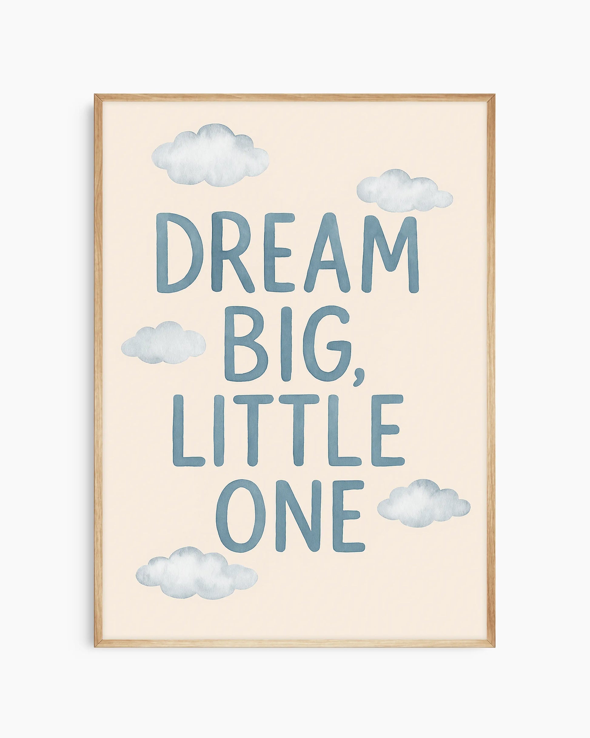 Framed artwork with 'Dream Big, Little One' text and cloud illustrations on a light background