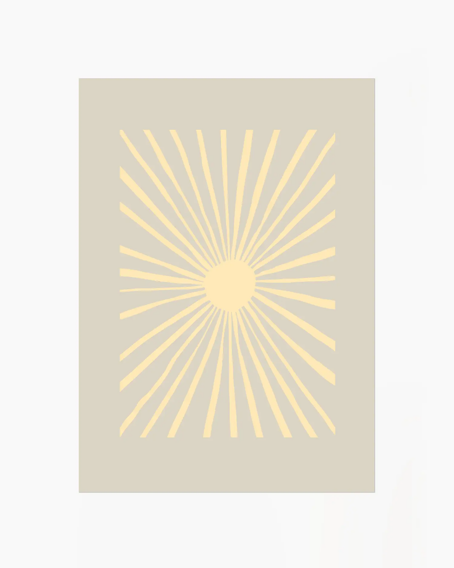 Beige rug with a yellow sunburst pattern on a beige background