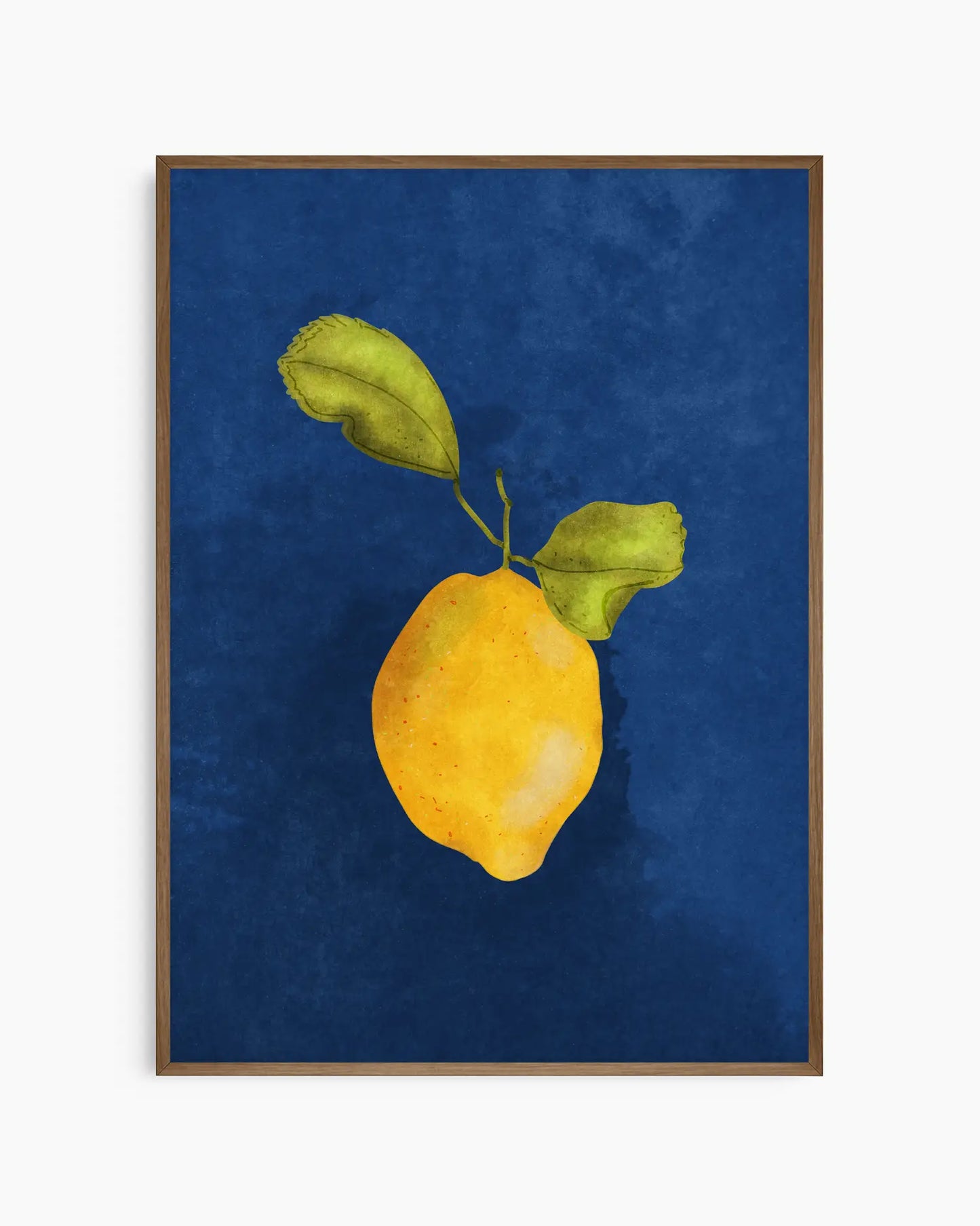 Framed artwork of a yellow lemon with green leaves on a blue background