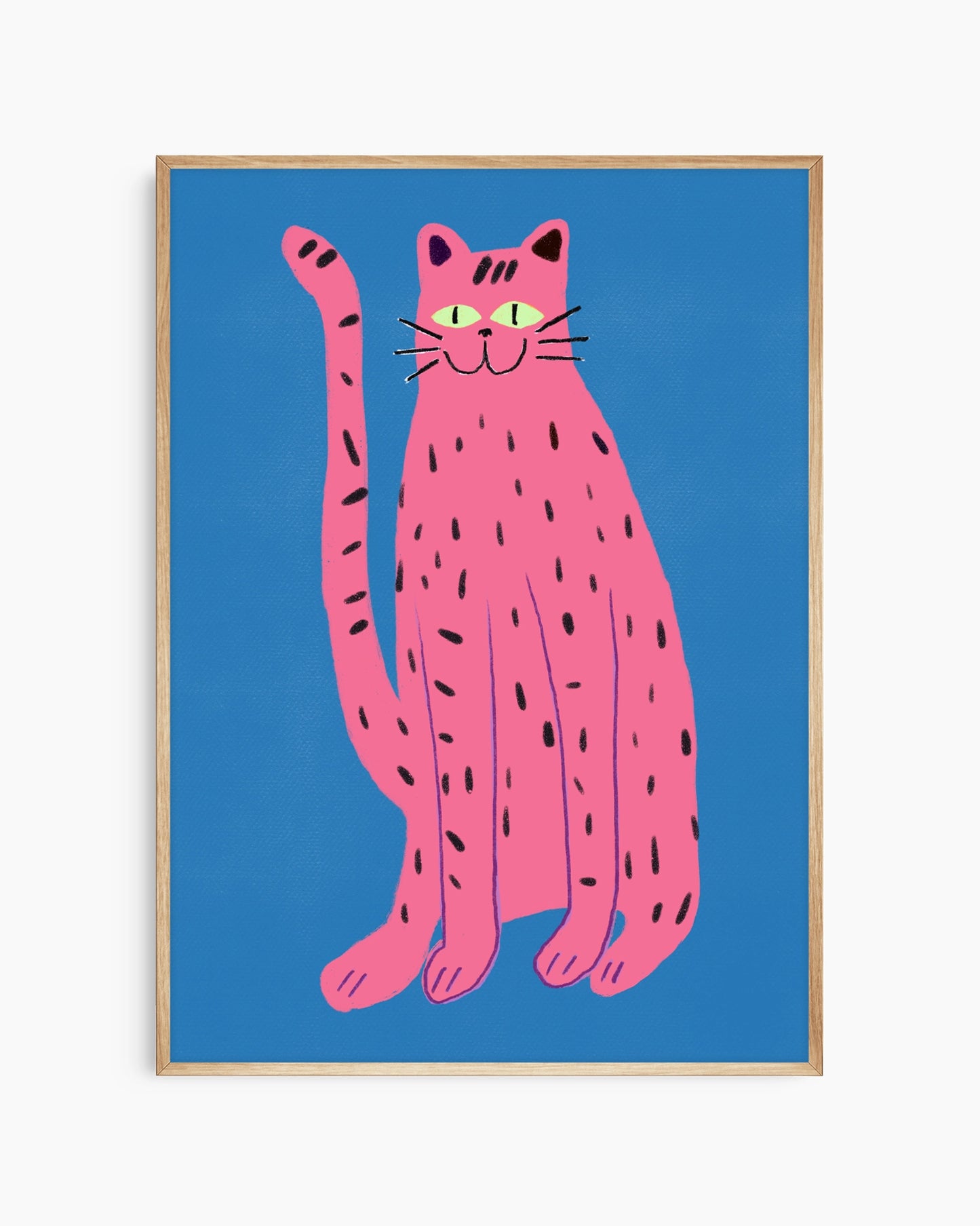 Framed artwork of a pink cat with black spots on a blue background