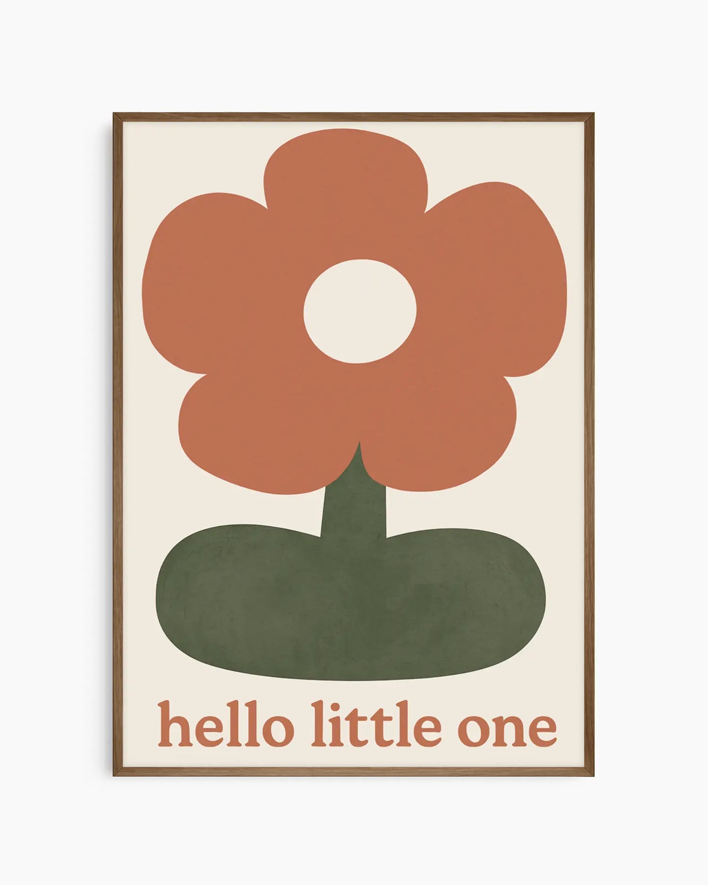 Framed artwork with a flower design and 'hello little one' text on a beige background