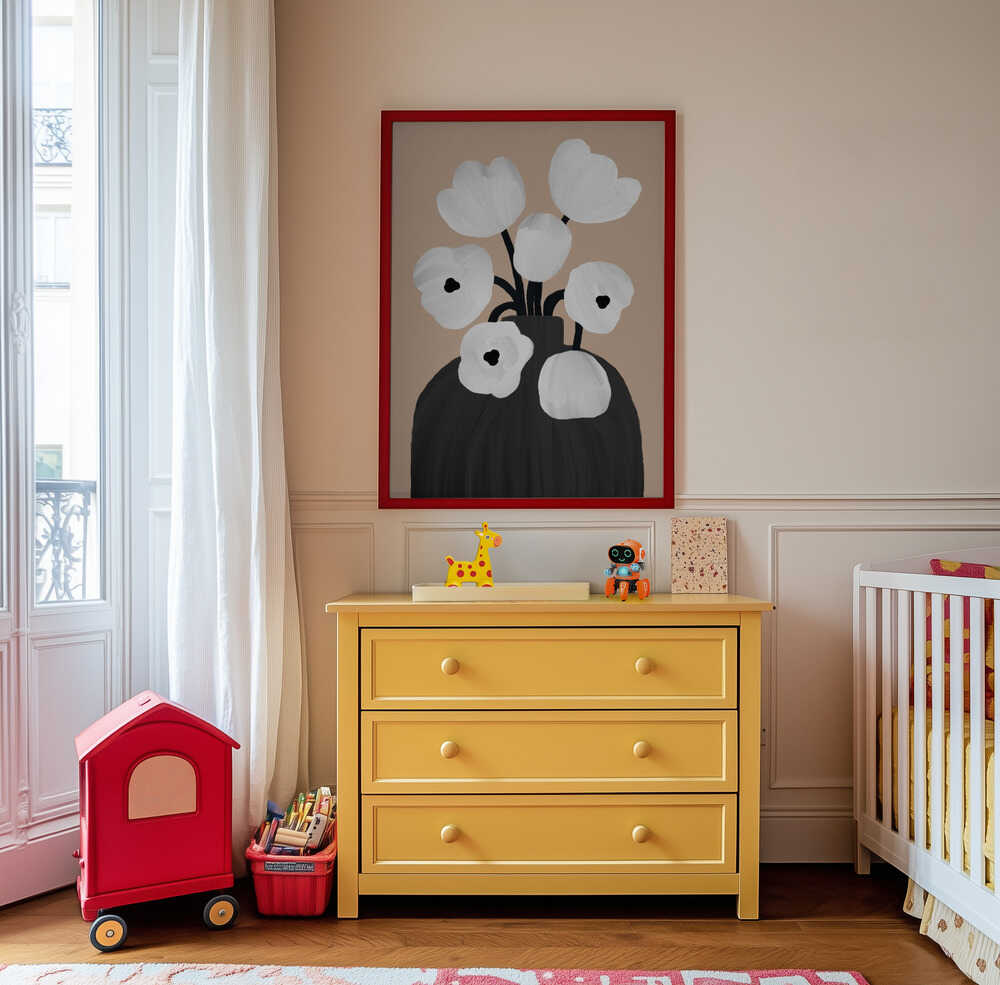 Stylish floral wall art featuring a black vase with white flowers, hanging above a yellow dresser in a kids’ room. A gentle and artistic print that adds a serene and natural touch to modern children’s spaces.