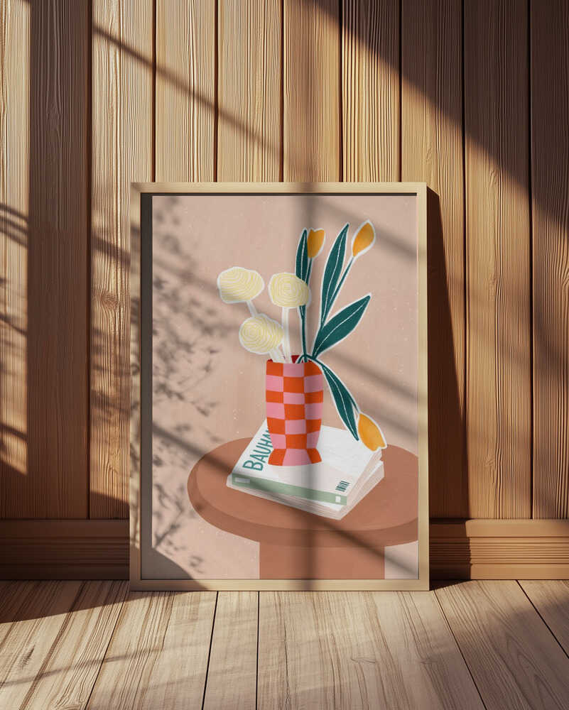 Beige children's poster with a brown side table with books on top and a pink and orange checkered vase with yellow flowers inside
