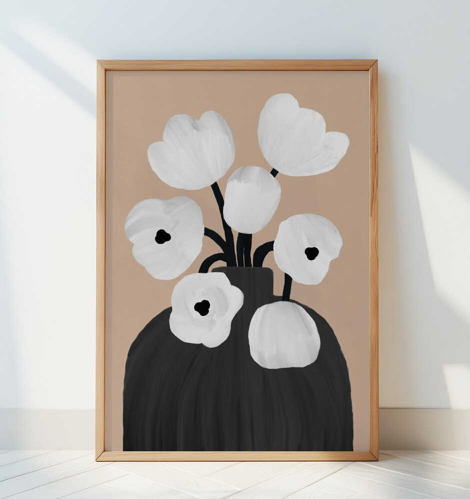 Modern black and white flower poster with soft beige background, framed in light wood and leaning against a white wall. A timeless and minimalist art print that brings calm and sophistication to contemporary home decor.