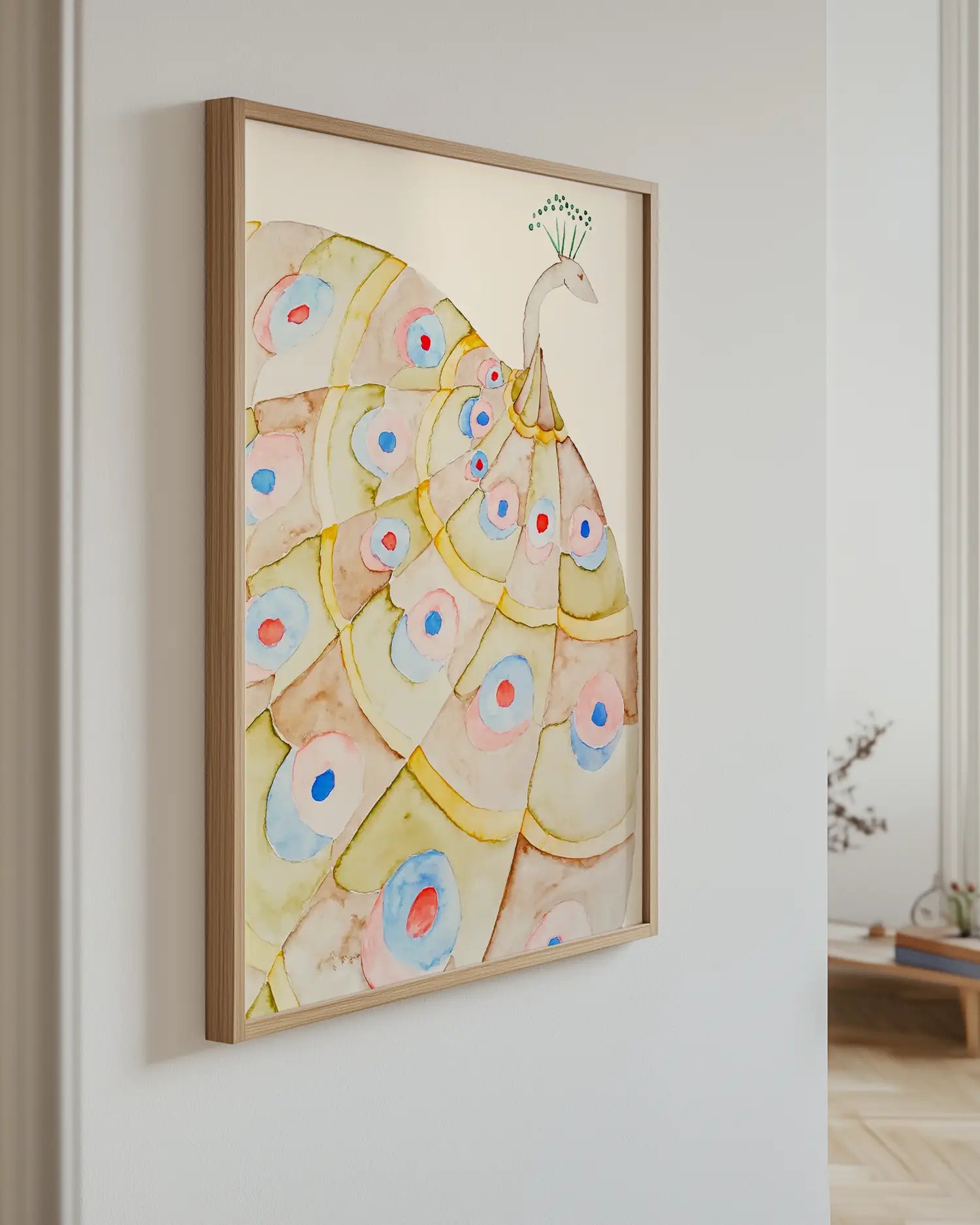 Artwork of a peacock on a white wall