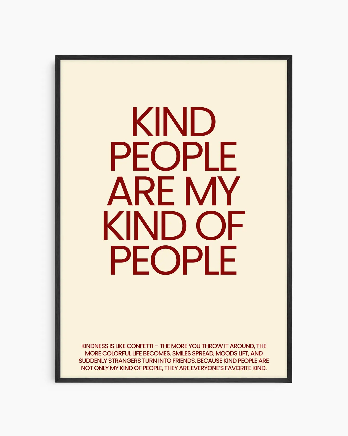 Nursery poster saying 'Kind people are my kind of people' in red, framed in a black frame.