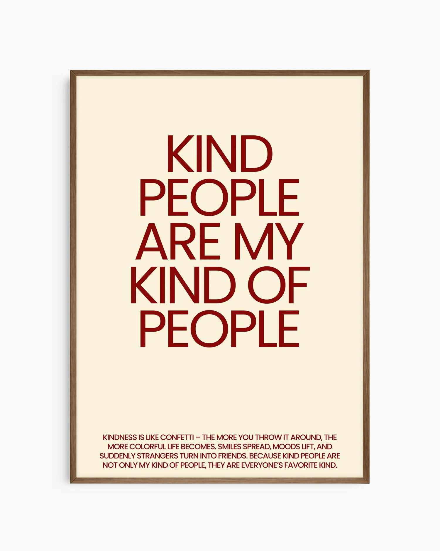 Nursery poster saying 'Kind people are my kind of people' in red, framed in a dark oak frame.