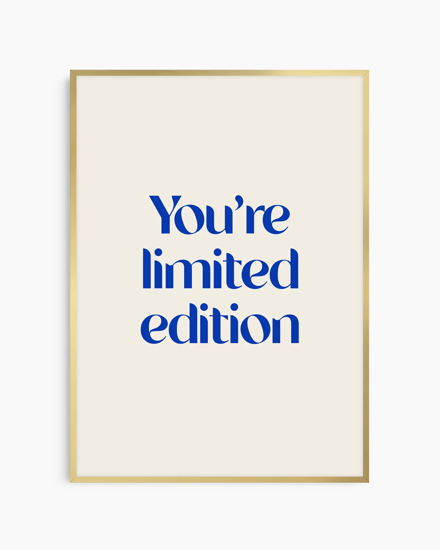 Nursery poster with 'You're limited edition' text in blue framed in a gold frame