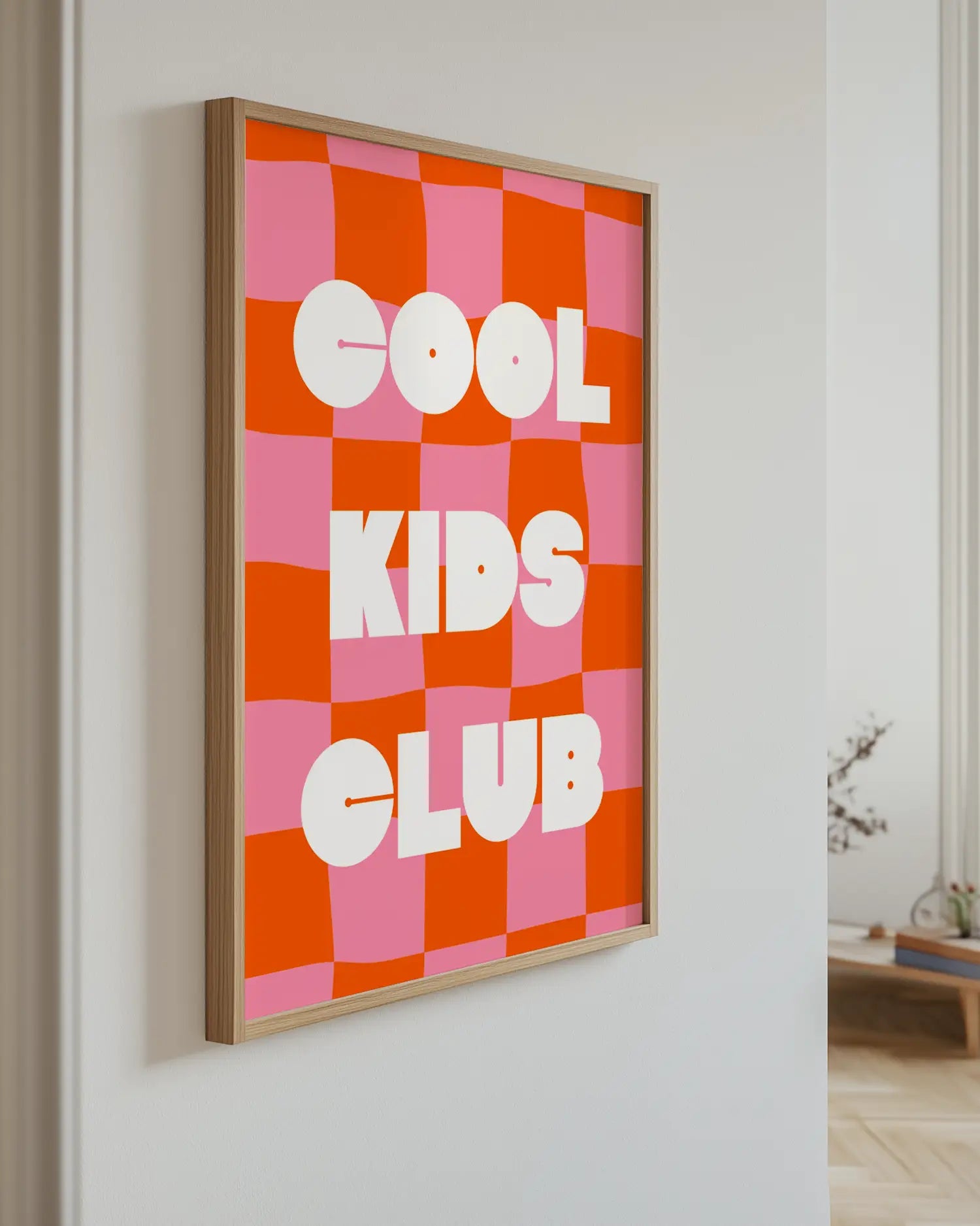 Poster with the text "Cool Kids Club" on the wall