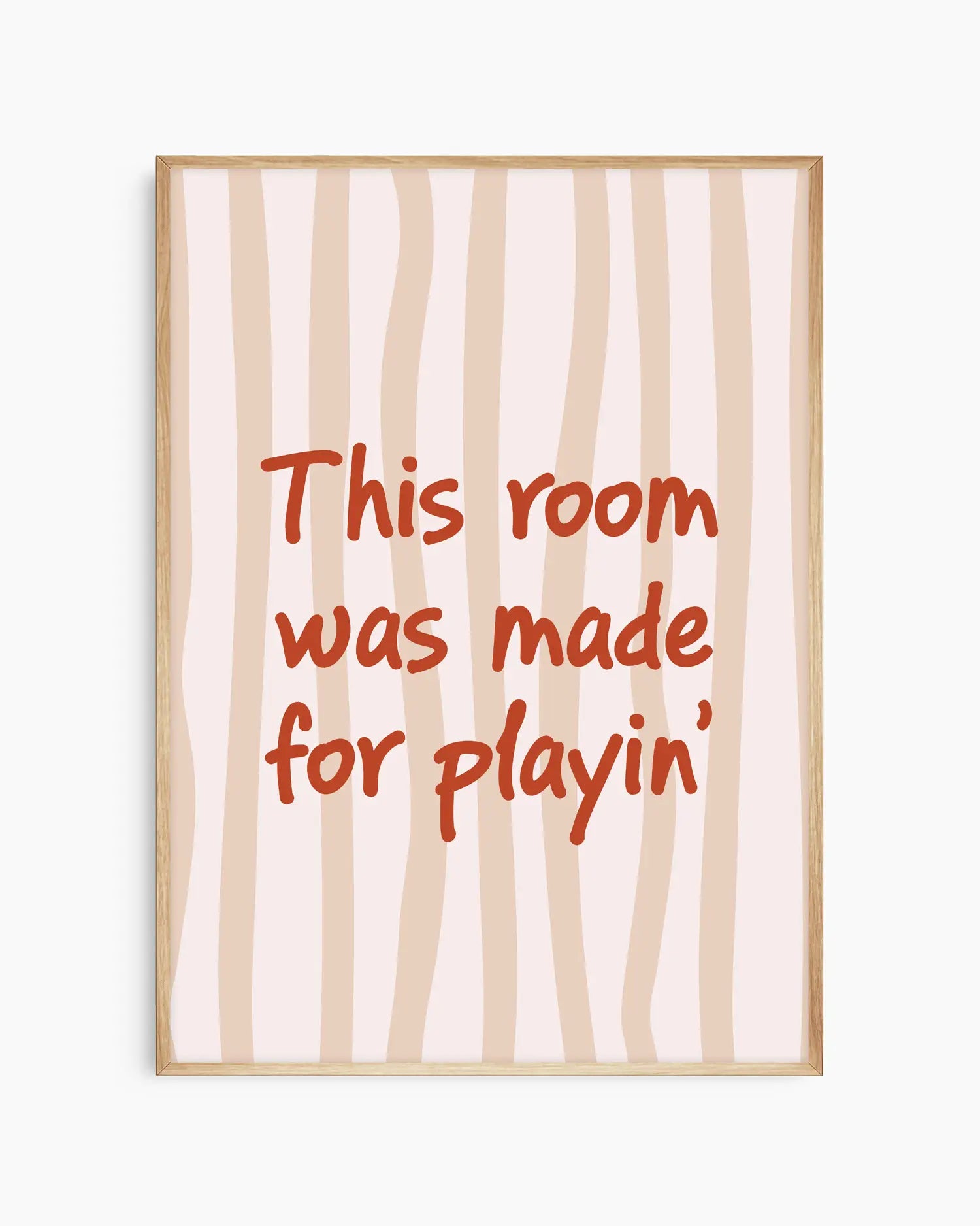 Nursery poster with text 'This room was made for playin'' on a beige striped background, framed in an oak wooden frame.