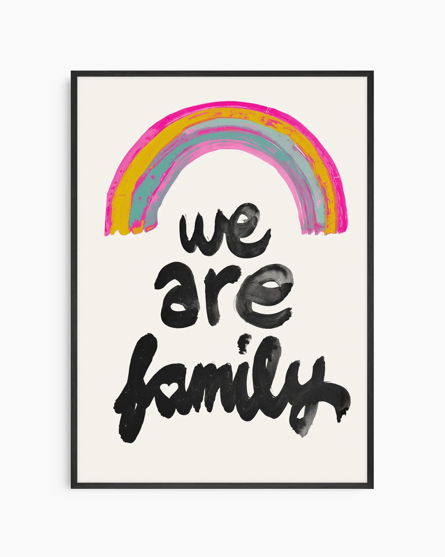 Framed artwork with a rainbow and 'we are family' text on a white background