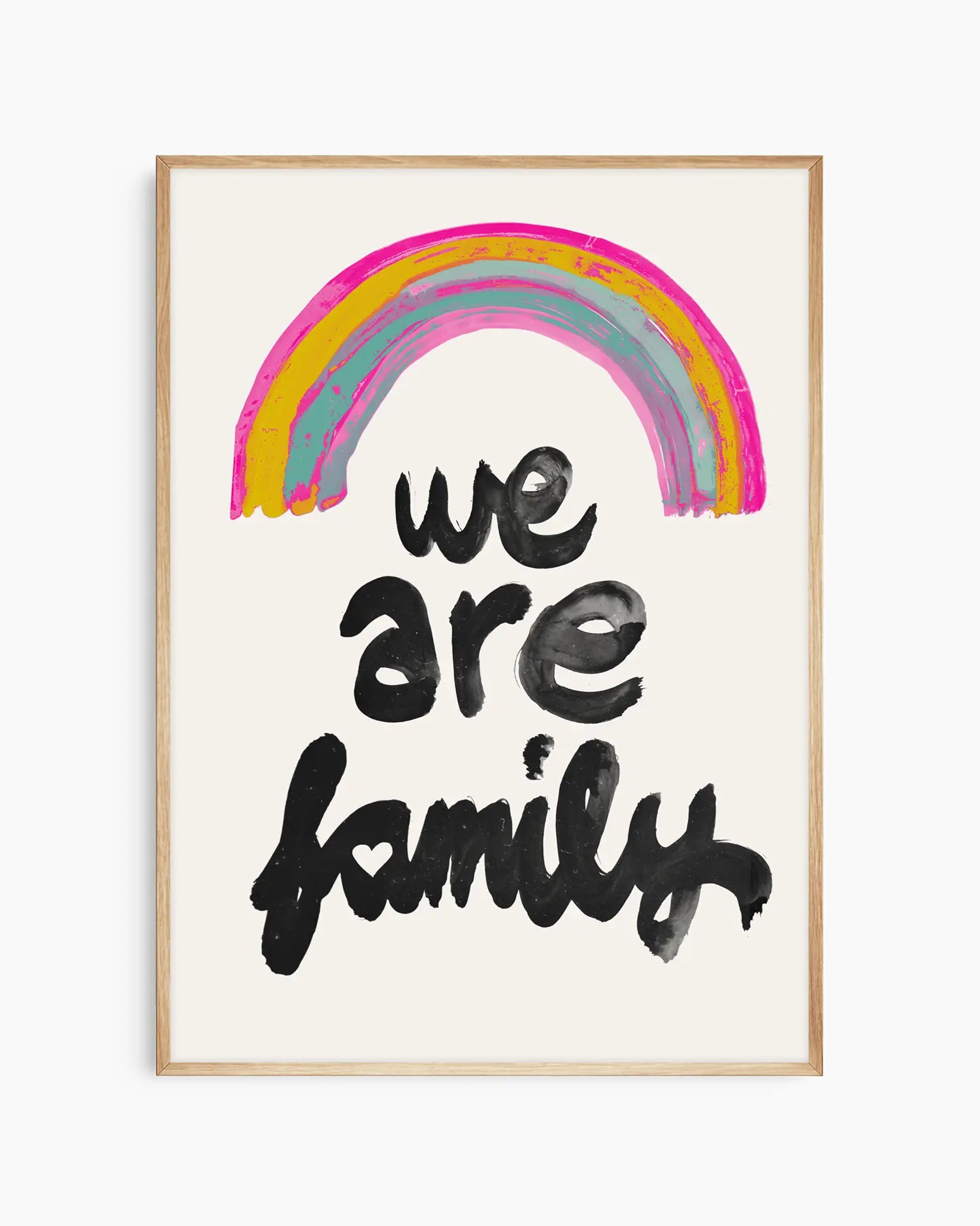 Framed artwork with a rainbow and 'we are family' text on a white background