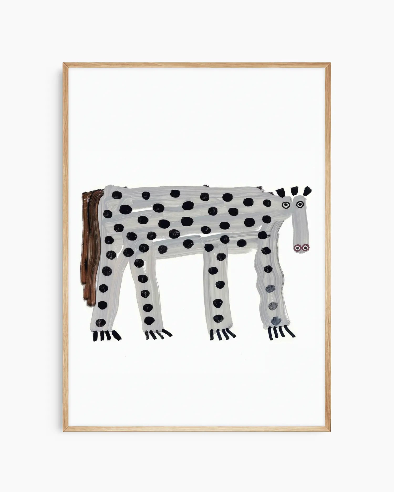 Framed artwork of a spotted animal on a white background