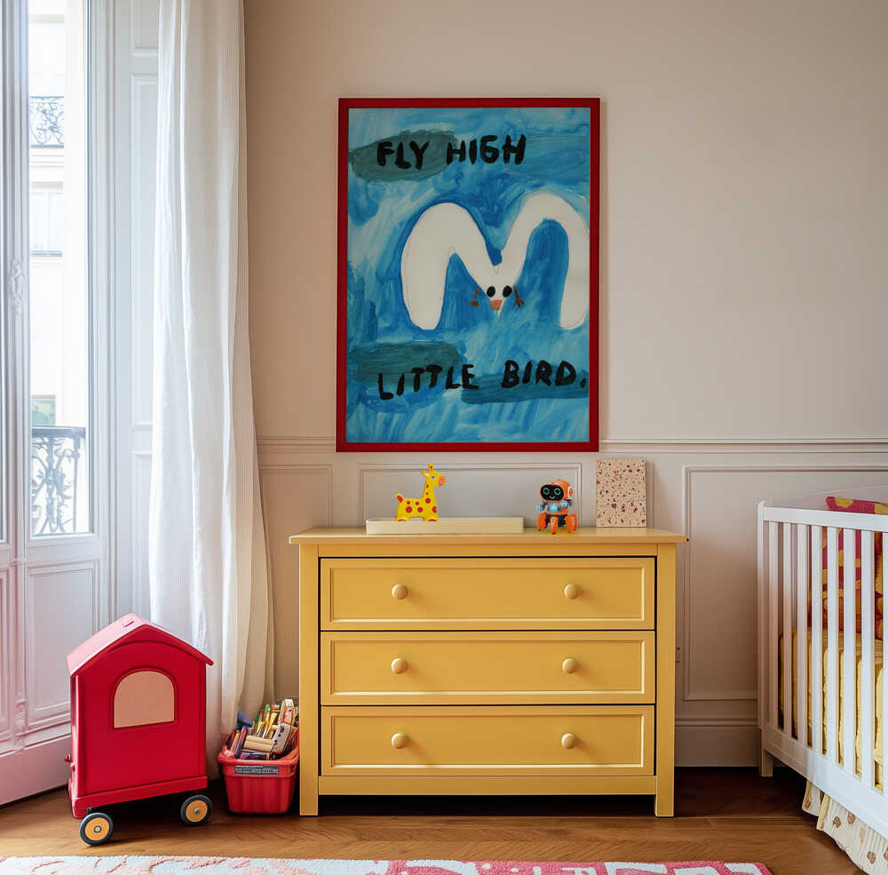 Framed “Fly High Little Bird” poster with hand-painted bird and inspiring text, adding creativity and encouragement to a playful kids’ room.