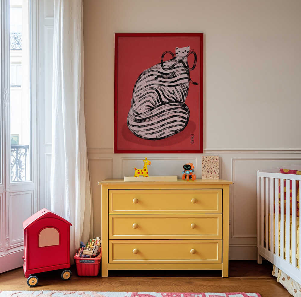 Framed striped cat poster hanging above a colorful dresser in a fun children’s room, bold and whimsical cat artwork on warm red background bringing creativity and personality to playful kids decor.