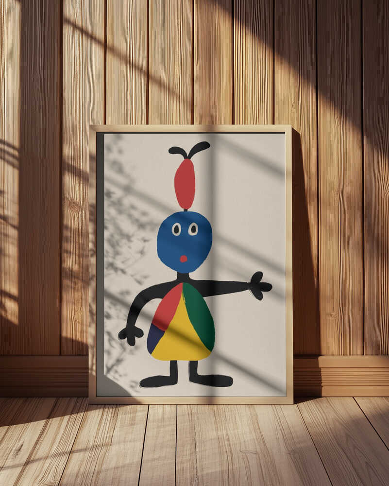 Framed art print featuring a playful abstract character in bold primary colors, illuminated by natural sunlight against a warm wooden wall.