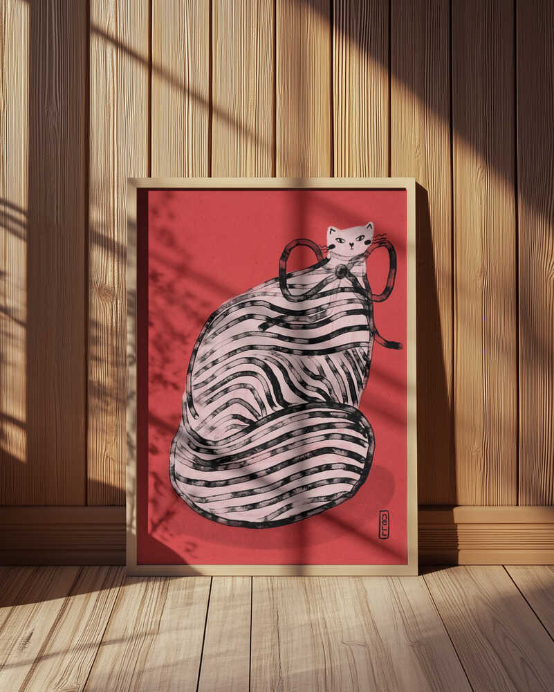 Framed artistic cat illustration poster leaning against wood-paneled wall with soft sunlight and shadows, striped cat on muted red background, cozy contemporary art decor for stylish interiors.