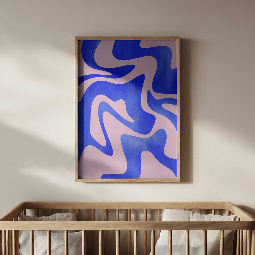 Soft pink and blue abstract poster framed in light wood and hanging above a baby’s crib. A stylish, calming wall art piece that adds color and modern design to a nursery or playroom.